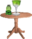 На столике стоят пузырьки с зеленой жидкостью, которая налита в кубок. Я бы пить не стала т.к. о предназначении содержимого знает лишь хозяйка